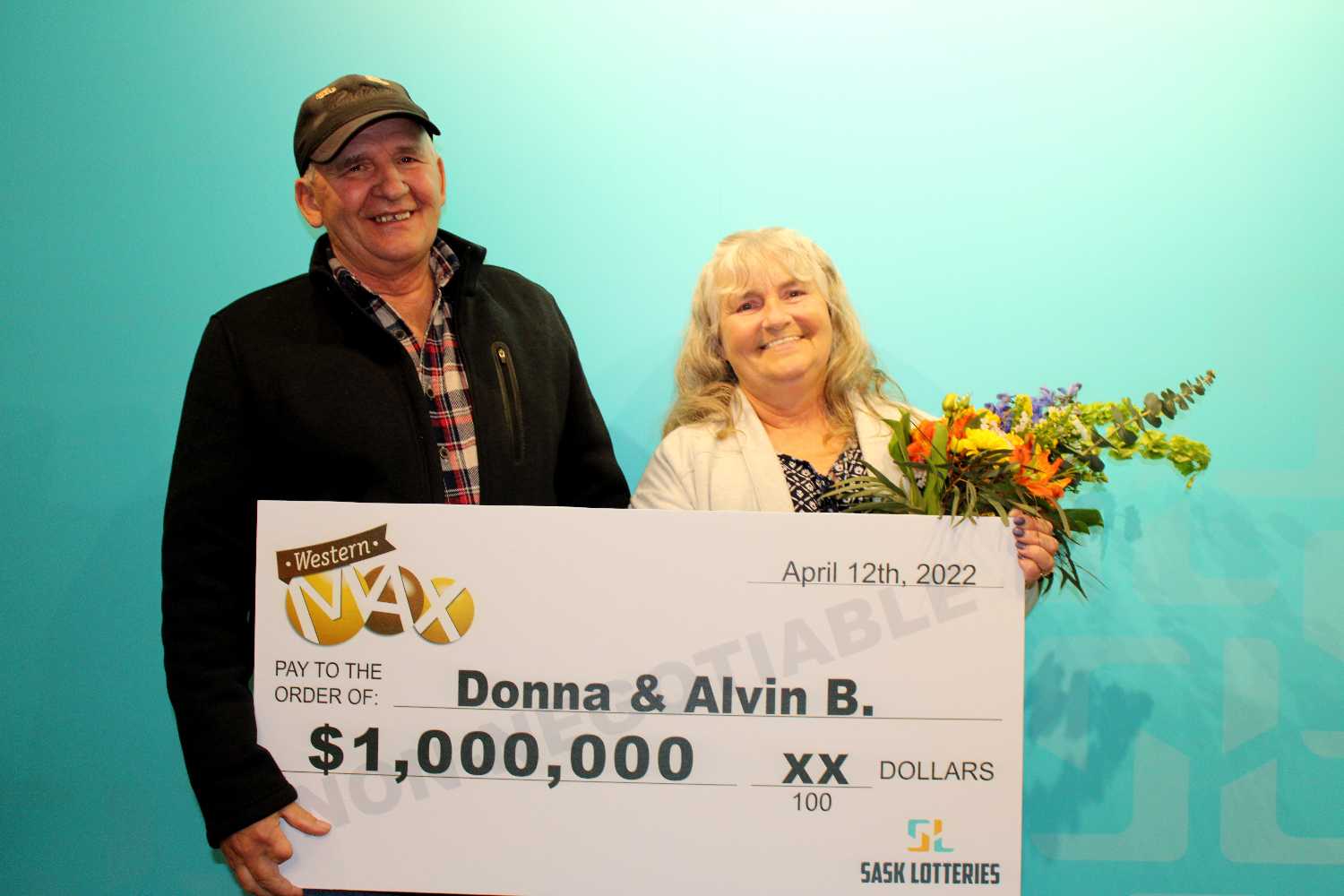 Donna and Alvin Bohn of Grenfell with their cheque for $1 million